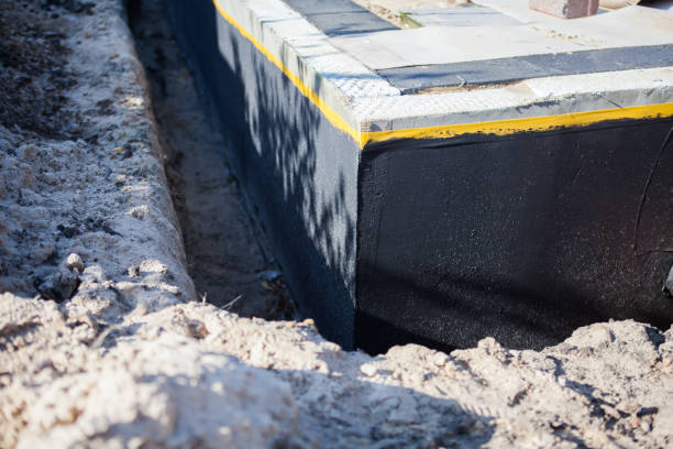 Professional Waterproofing technician working in Arcola, VA